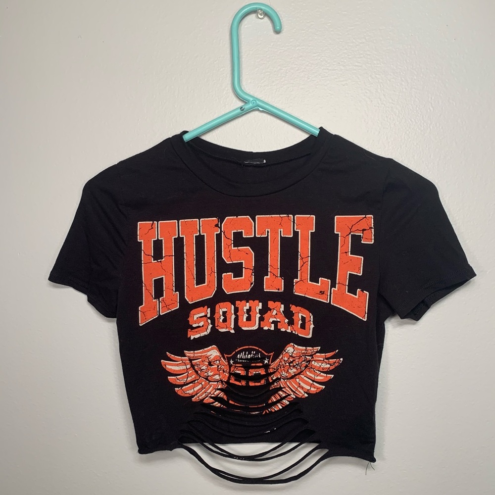 Black hustle crop top with ruffle cut.